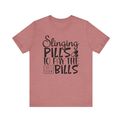 "Slinging pills to pay the bills" - Unisex Jersey Short Sleeve Tee - Nurse