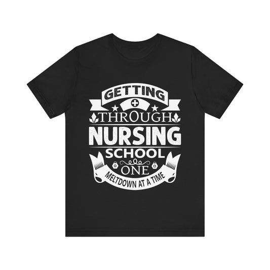 "Unisex tee with 'Getting through nursing school one meltdown at a time' in college-style letters. Lightweight cotton, ribbed collar, crew neckline. Free USA shipping."